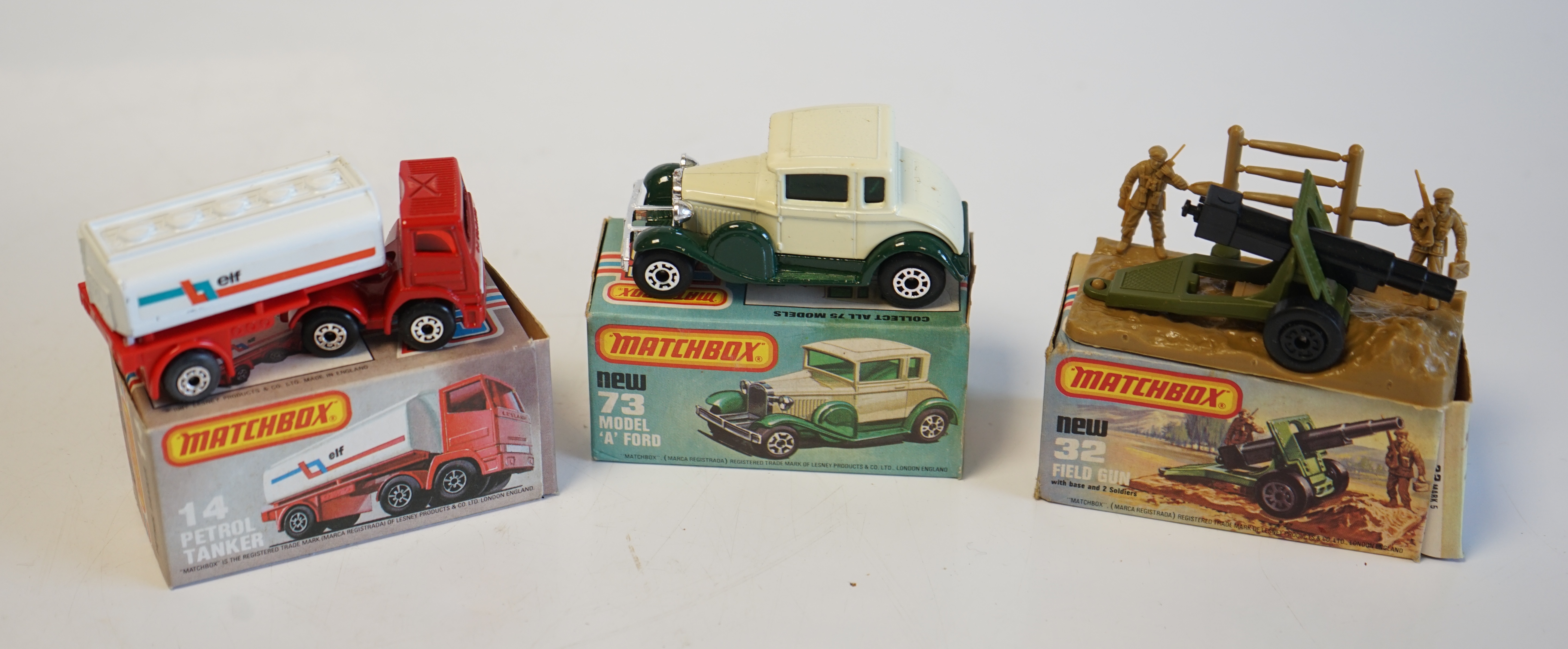 Seventeen boxed Matchbox Series 1-75 diecast vehicles including; 1; Dodge Challenger, 9; Ford RS 2000, 10; Plymouth Police Car and another, 11; Car Transporter, 14; Petrol Tanker and another, 28; Formula Racing Car, 32;